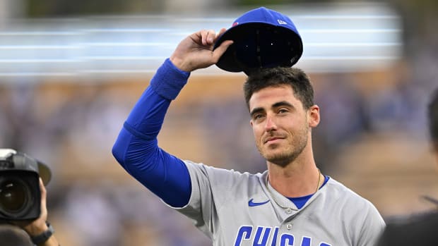 Apr 14, 2023; Los Angeles, California, USA; Chicago Cubs center fielder Cody Bellinger (24) acknowledges the crowd during a video tribute prior to the game against the Los Angeles Dodgers at Dodger Stadium. Mandatory Credit: Jayne Kamin-Oncea-USA TODAY Sports  